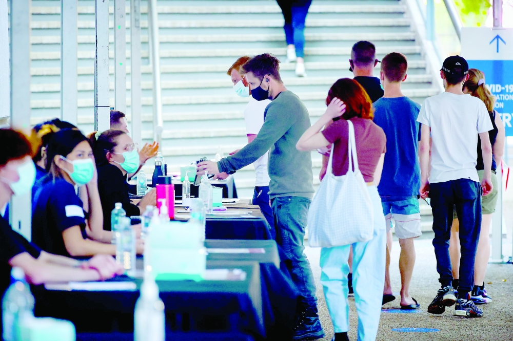 استمرار حملة التطعيم في استراليا.  ا ف ب