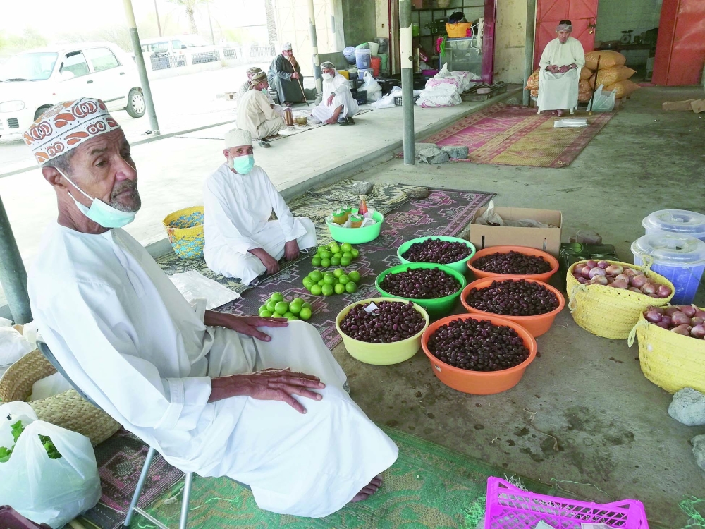 بائع تمور بسوق الحمراء