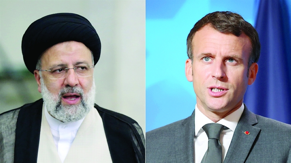 إيمانويل ماكرون وإبراهيم رئيسي