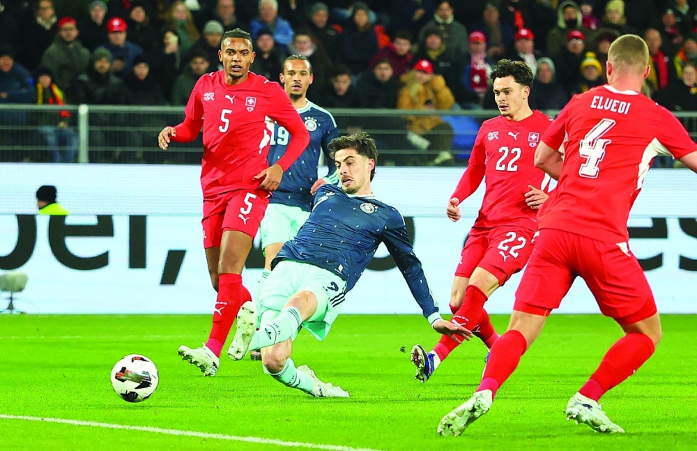 كاي هافرتس لاعب ألمانيا يسدد نحو مرمى سويسرا   «رويترز»     